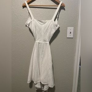 Women’s bridal shower white dress.